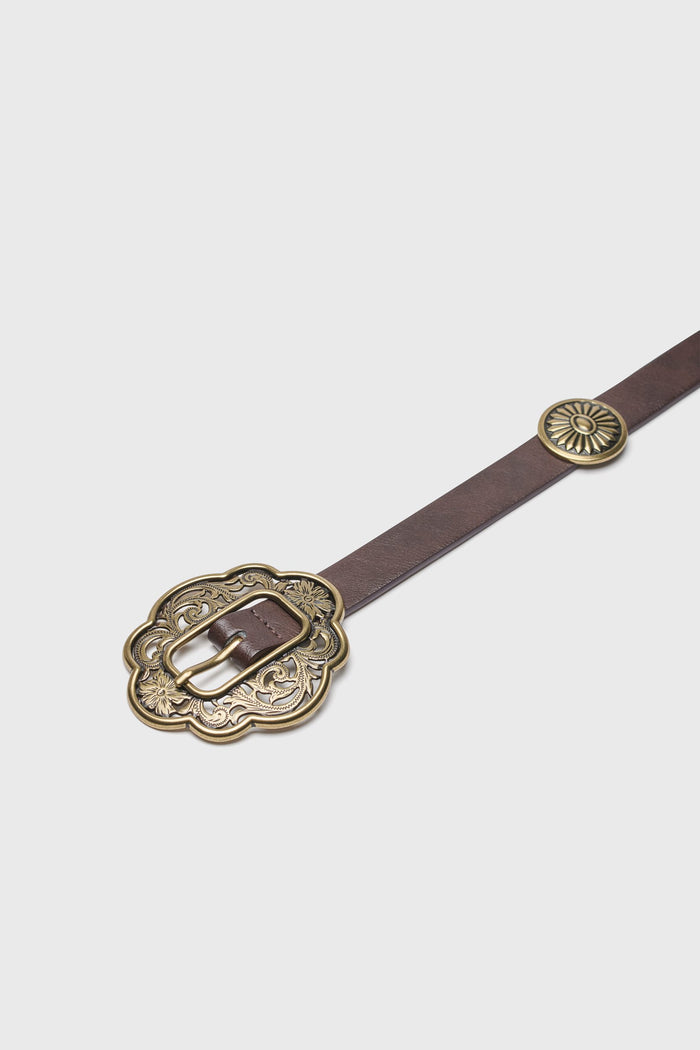 Belt with ornate buckle