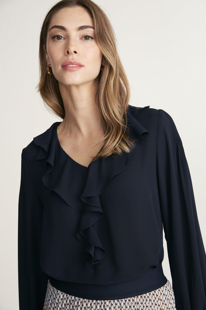 blouse with ruffle and smocking sleeve