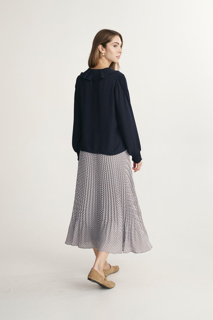 blouse with ruffle and smocking sleeve
