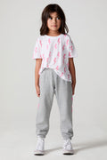 Full body front view of a girl wearing the Chaser  Bolting Bolt Pant on a neutral background