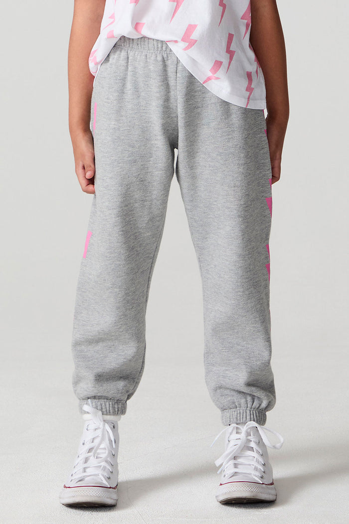 Front view of a girl wearing the Chaser  Bolting Bolt Pant on a neutral background