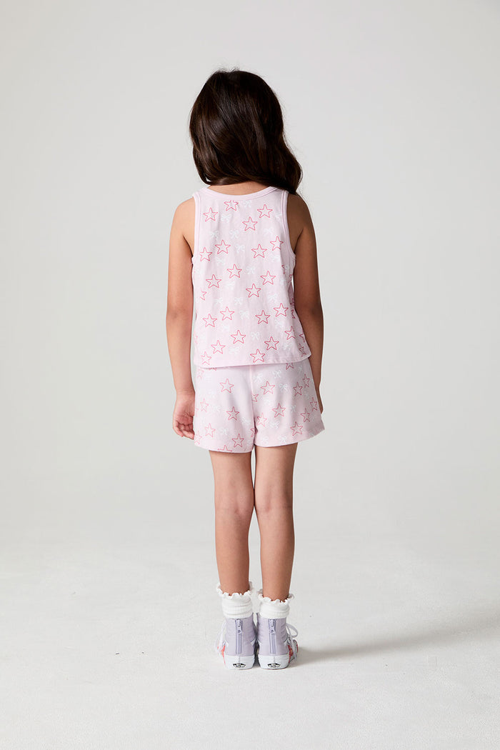 Back view of a girl wearing the Chaser Check Bow Tank  on a neutral background