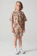 Full body front view of a boy wearing the Chaser Construction Days Shorts on a neutral background