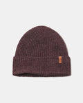 Front view of Cozy Marled Beanie showcasing ribbed knit and folded cuff with small leather logo tag on light gray background