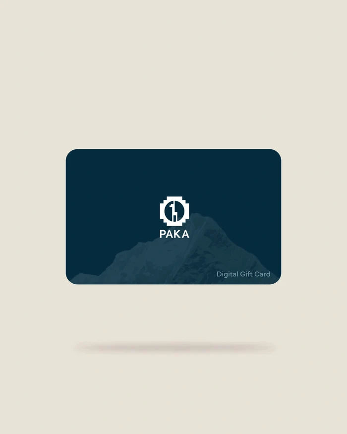 Front view of PAKA digital gift card with white PAKA logo, mountain graphic, and ‘Digital Gift Card’ text on a beige background
