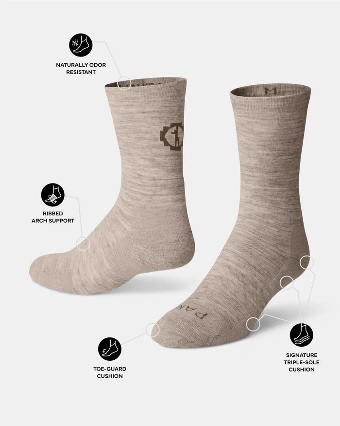 Timber socks with arch support and cushioning features on a white background