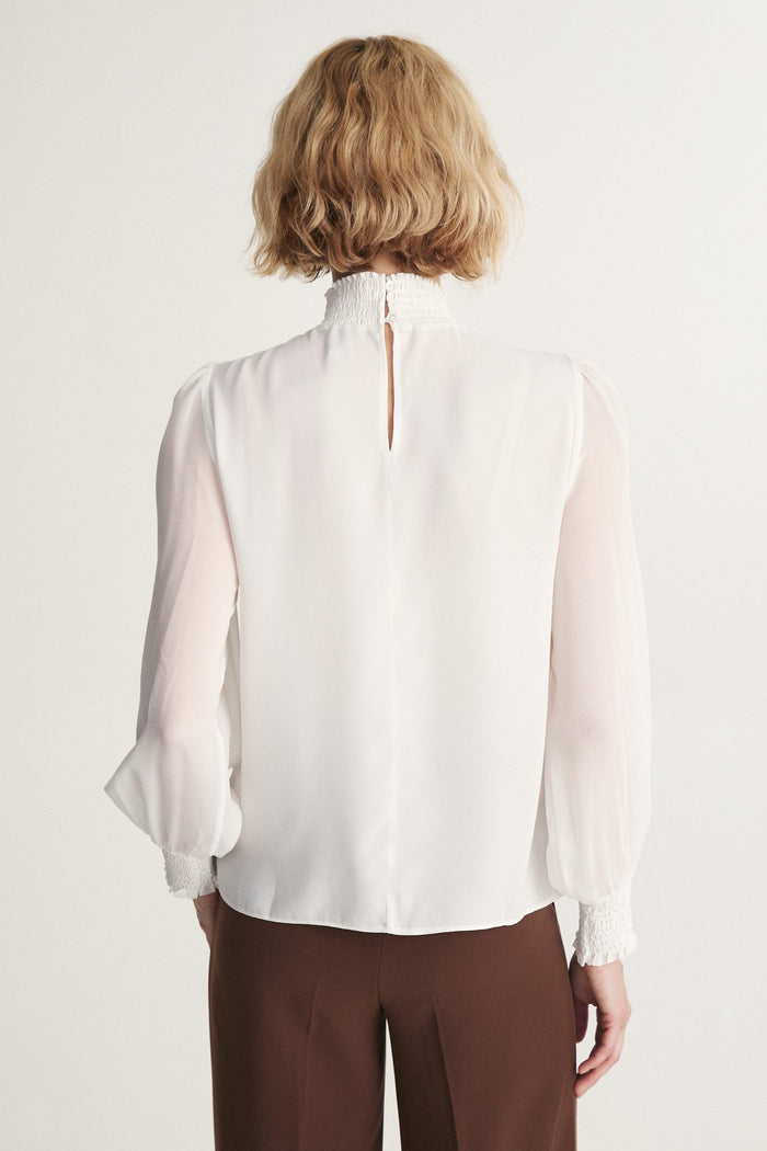 Fluid blouse with ruching
