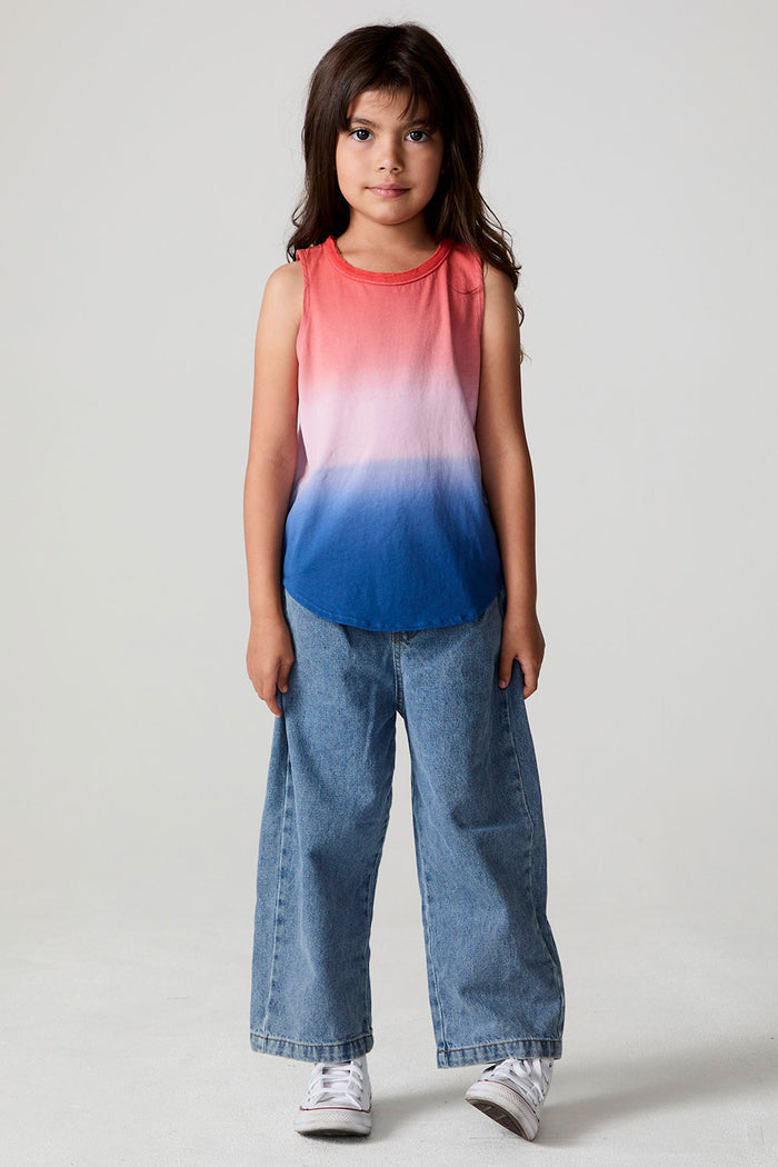 A full body front view of a girl wearing the Chaser Fruit Popsicle Tank and jeans on a neutral background