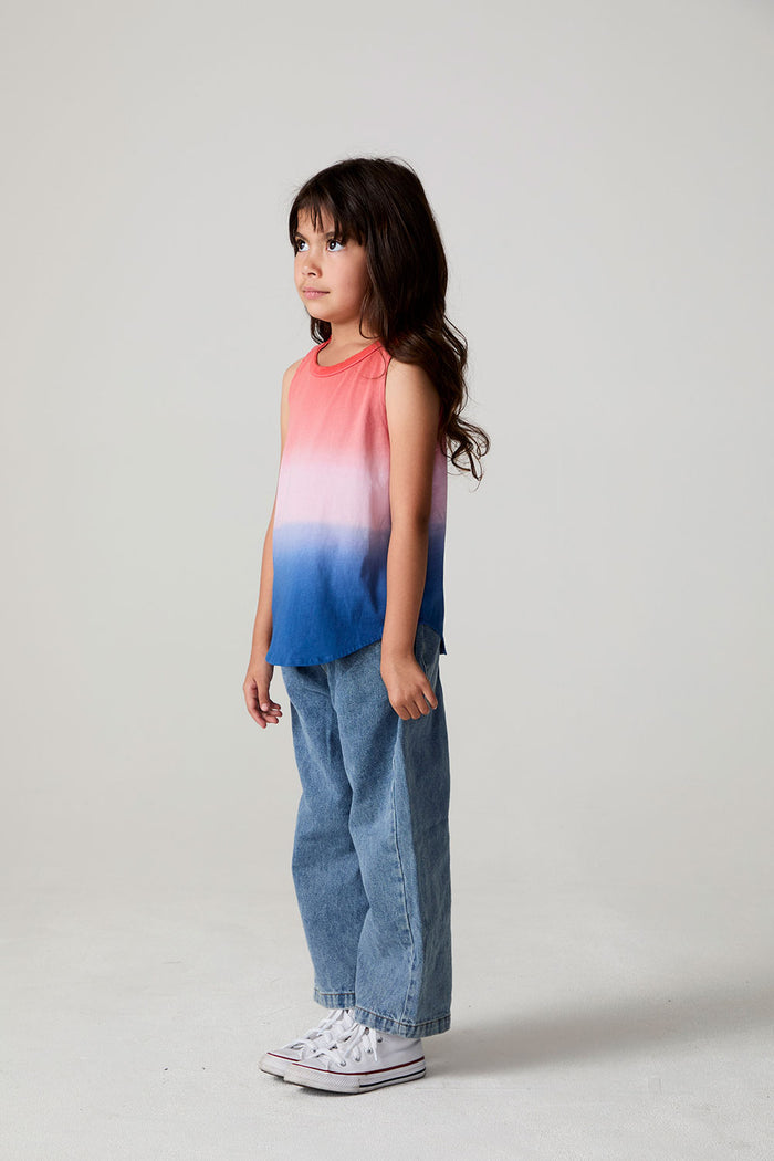 Full body side angle view of a girl wearing the Chaser Fruit Popsicle Tank on a neutral background