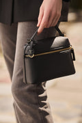 Handbag with shoulder strap