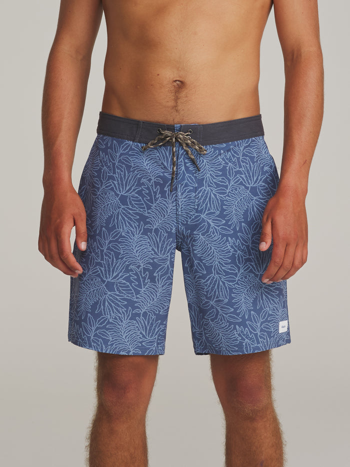 Katin Lush Hybrid Trunk in Blue, worn by a model, front view showing the patch pockets #color_blue