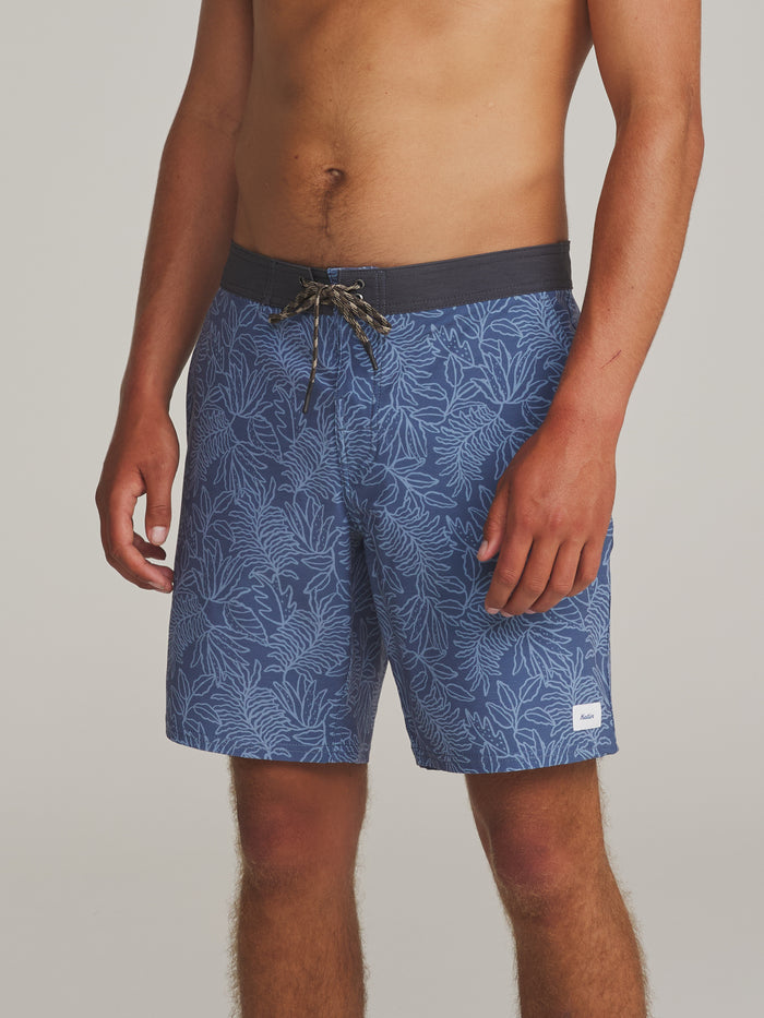 Katin Lush Hybrid Trunk in Blue, worn by a model, side view #color_blue