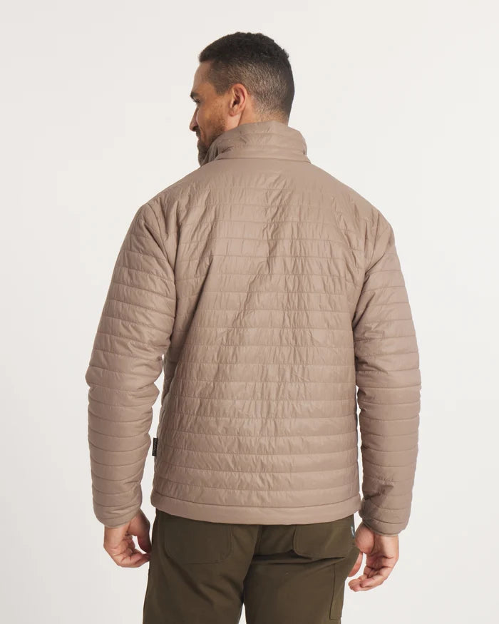 Back view of Men’s Mayu Ultralight Jacket in Fossil tan with horizontal quilting and alpaca insulation on model