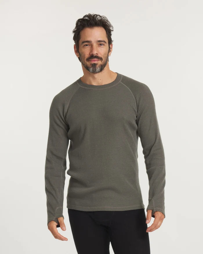Front view of Men’s Thermal Crew alpaca baselayer in Andean Moss, slim fit with raglan sleeves and thumbholes on white