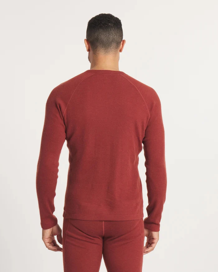 Back view of Men’s Thermal Crew alpaca baselayer in clay showing raglan shoulder seams and fitted long sleeves on white