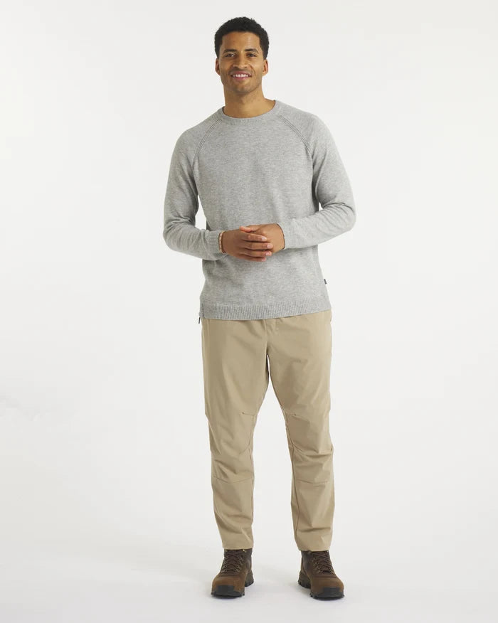 Front view of Men’s Ultralight 1.0 Crew alpaca sweater in heather grey, showing raglan sleeves and slim fit on model