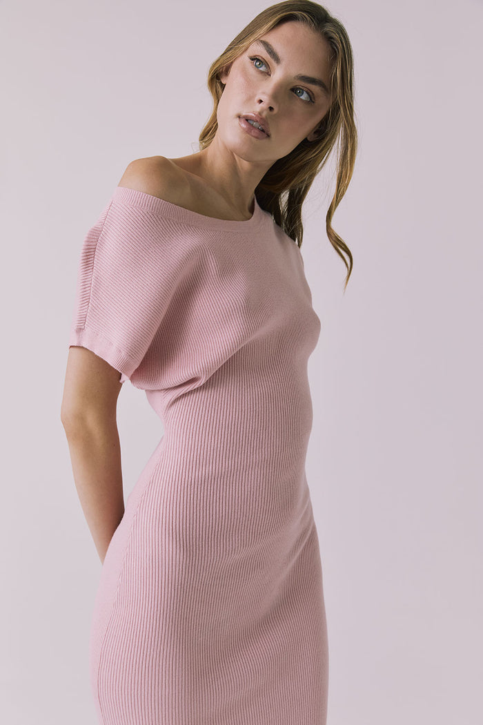 Close-up view of the Chaser Porter Midi Dress in Pink Salt highlighting the ribbed knit texture and neckline detail