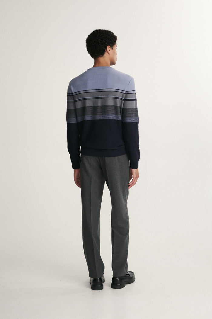 Reverse knit striped sweater