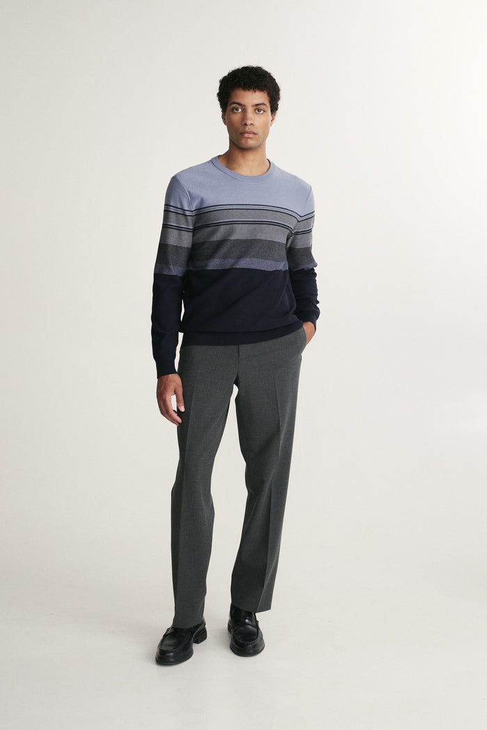 Reverse knit striped sweater