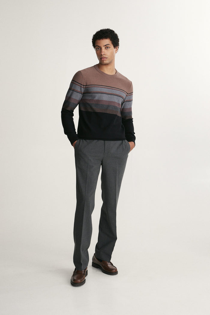 Reverse knit striped sweater
