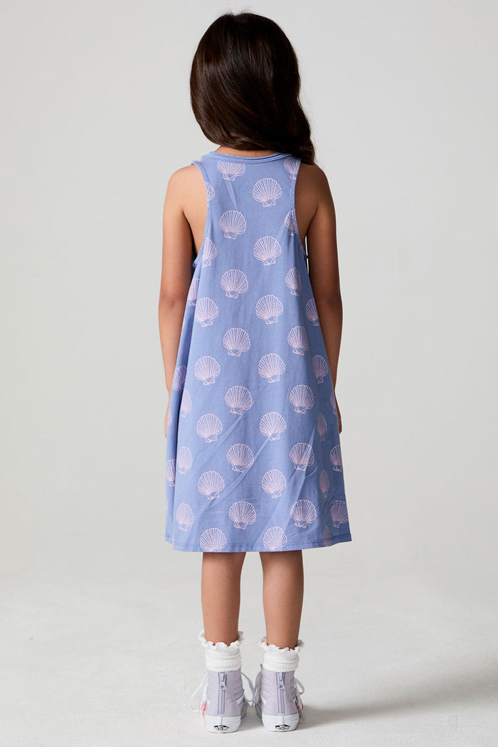 A full body back view of a girl wearing the Chaser Seashell Dreams Allover Dress on a neutral background
