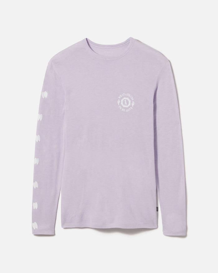 Front view of Sebastian long-sleeve shirt showcasing light lavender color, small chest logo and white heart prints down the sleeve on white background