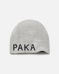 Top view of Skull Cap Beanie showcasing light grey knit and PAKA logo on cuff against white background