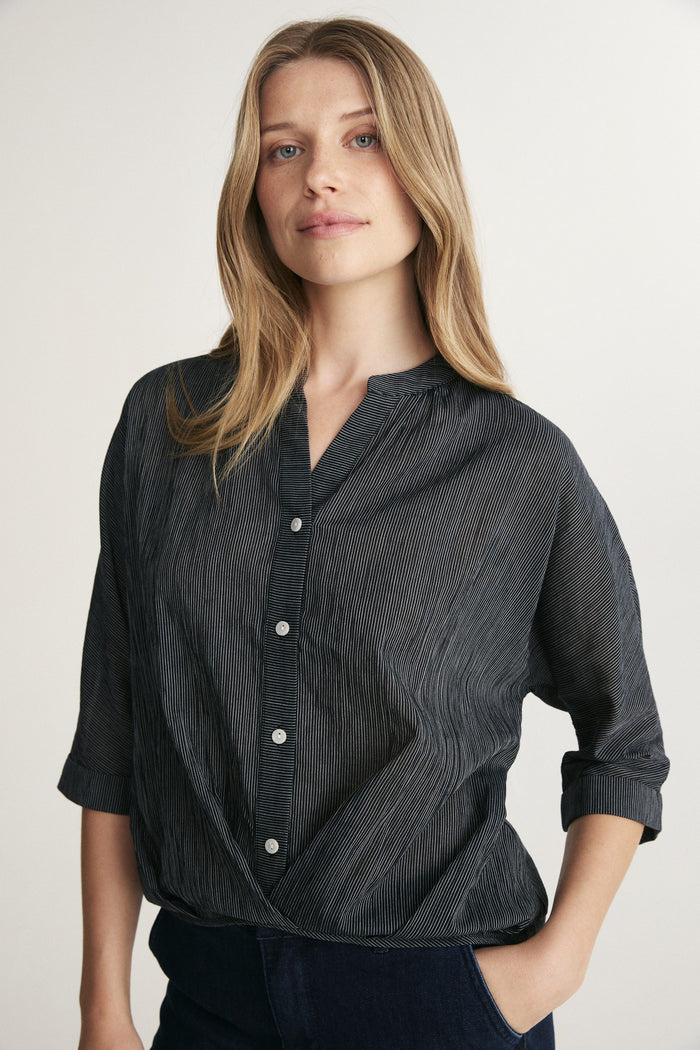 Sleeve dolman top with pleats at front