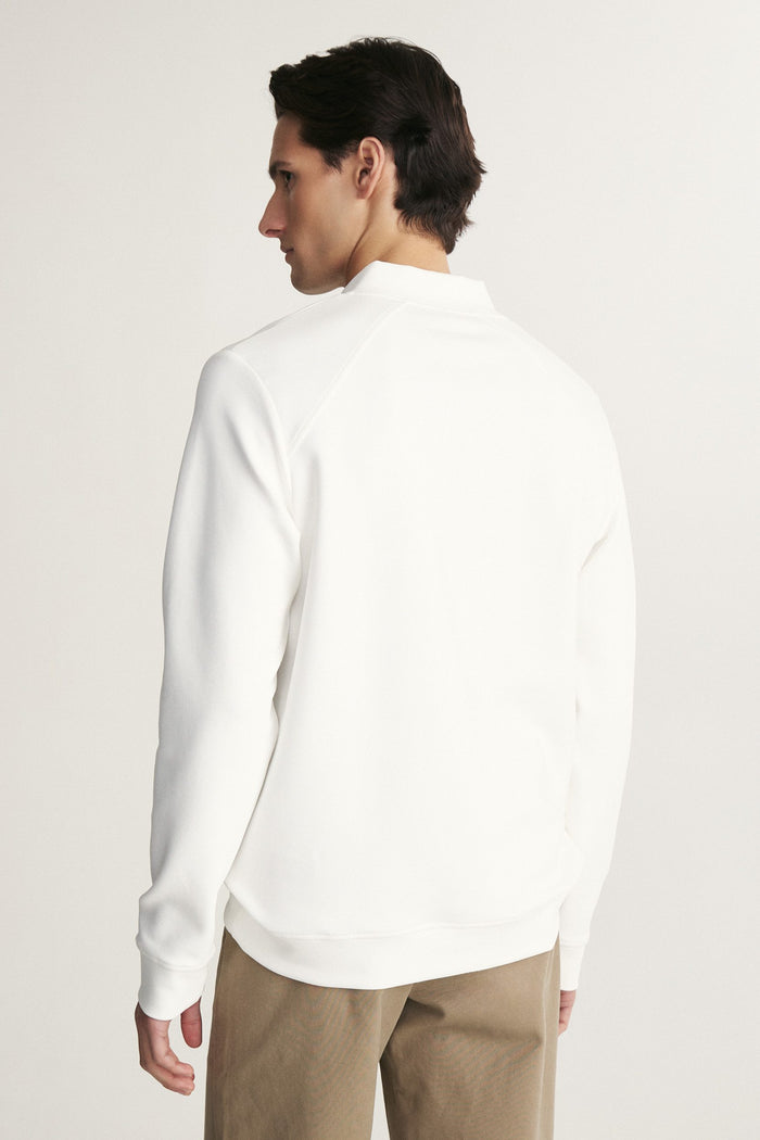 Textured half zip mockneck