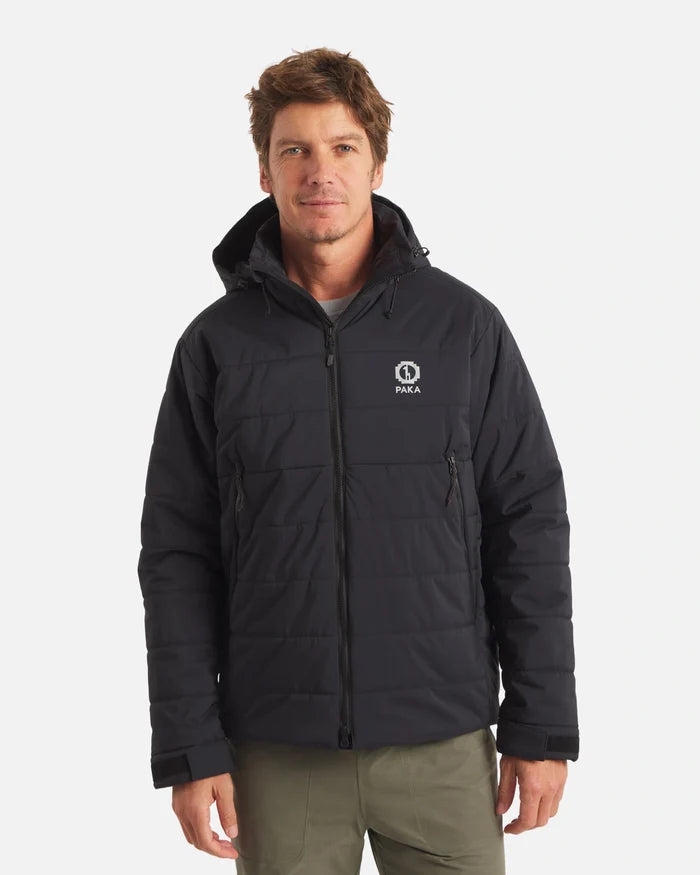 Front view of The Huascarán Jacket in black, showing puffer quilting, hood, zip pockets, and PAKA logo on gray background