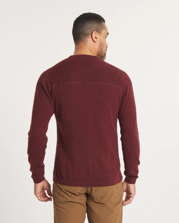 Back view of The Lightweight Crew sweater in burgundy showcasing yoke seam and relaxed fit on model against white background