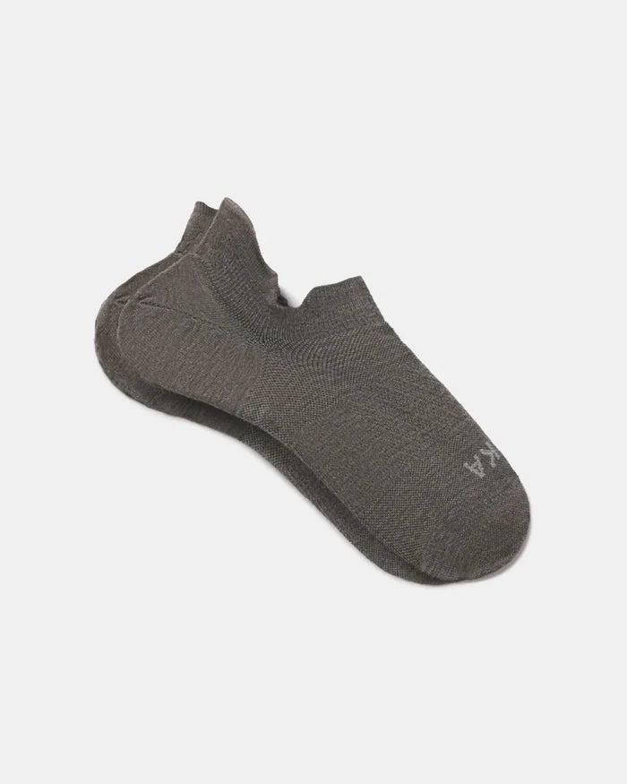 Angled view of Trail Ankle Socks showing low-cut ankle, breathable alpaca knit and cushioned heel on white background