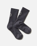 Top-down view of Trail Crew Socks showcasing charcoal blue color, crew height, cushioned footbed and PAKA logo on white background