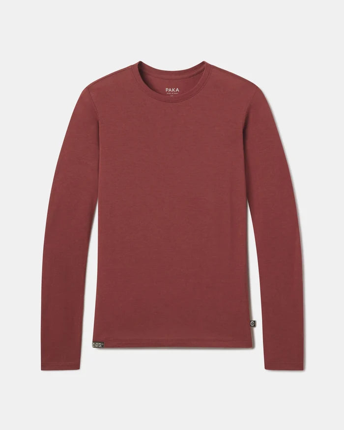 Front flat lay of Women’s Aire long sleeve shirt showcasing slim, lightweight alpaca-blend knit in clay on light gray background