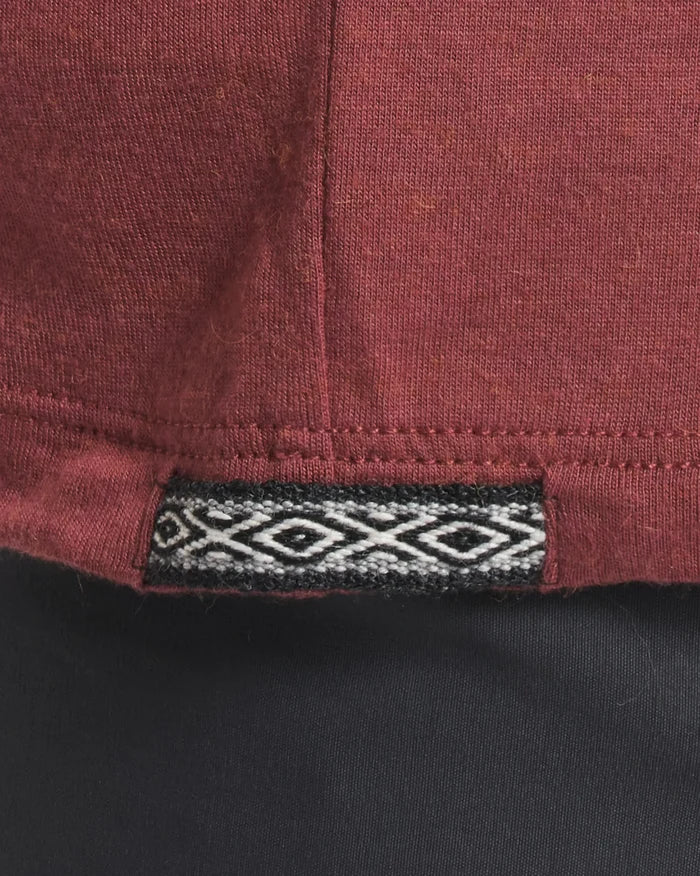 Close-Up of Inca ID on Women's Aire Lightweight Long Sleeve Hiking Shirt in Clay / Red – PAKA Apparel