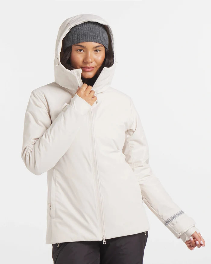 Front view of Women’s Apu Parka in white showcasing the hood up and zip-front on a plain light background