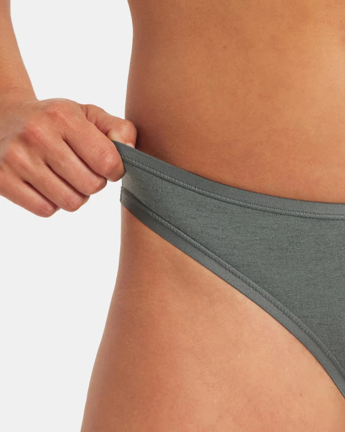 Close up side view of Women’s Essential Bikini Brief in balsam showcasing low profile cut and stretchy waistband on white background