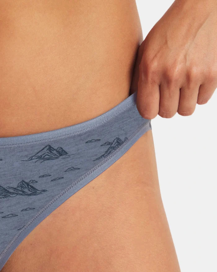 Close-up side view of Women’s Essential Printed Bikini Brief in bluestone showcasing mountain print, elastic waistband, and alpaca natural-fiber fabric on white background