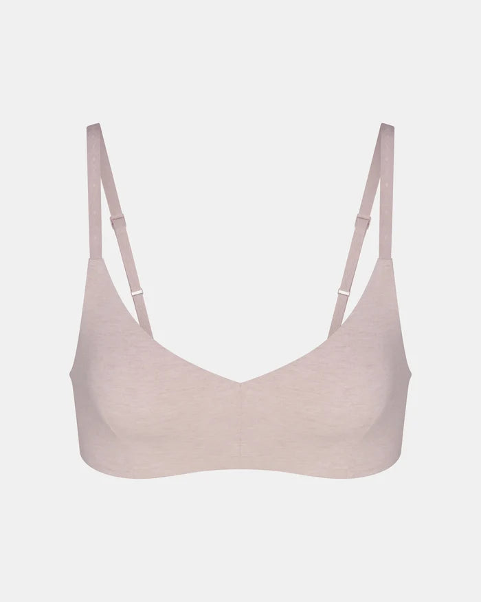 Front view of women’s triangle bralette in light mauve heather with organic cotton and adjustable straps on white background