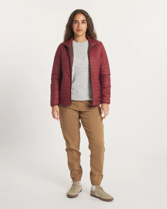 Front view of Women’s Mayu Ultralight Jacket in burgundy showing quilted insulation, worn by model on neutral background