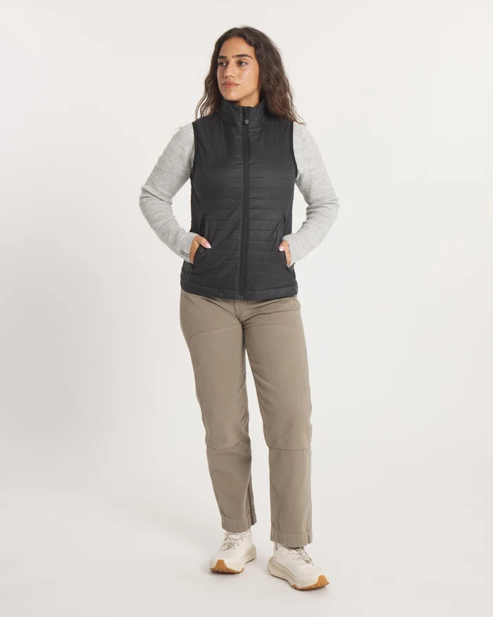 Front view of Women’s Mayu Ultralight Vest in black on model, slim fit with zip front and side pockets, light background