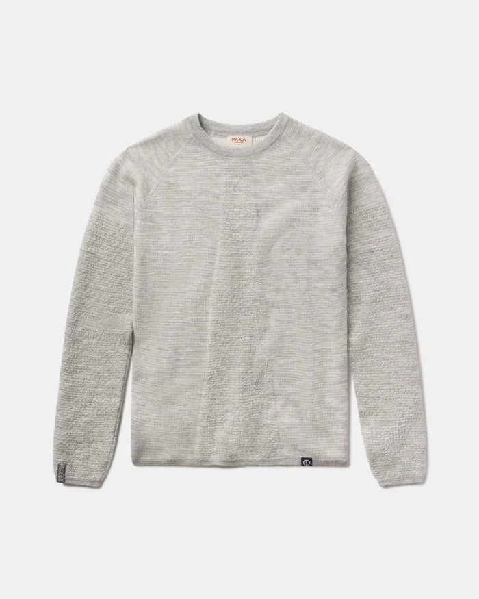 Front view of Women’s Mountain Crew sweater showcasing heather grey textured knit and crew neckline on light gray background