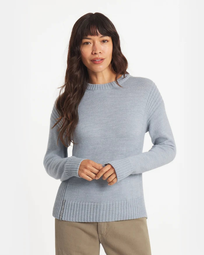 Front view of Women’s Original Crew alpaca crewneck in sky blue, ribbed cuffs and hem, relaxed fit on model, white background