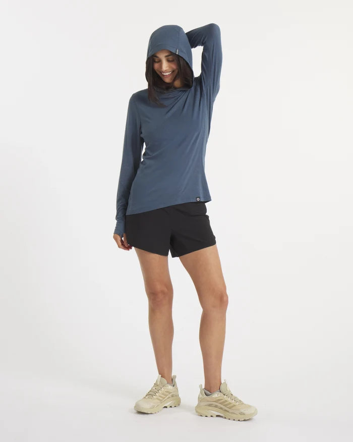 Model with Hand Behind Head Wearing Sol Navy Women's Sun Hoodie with Hood Up – PAKA Apparel