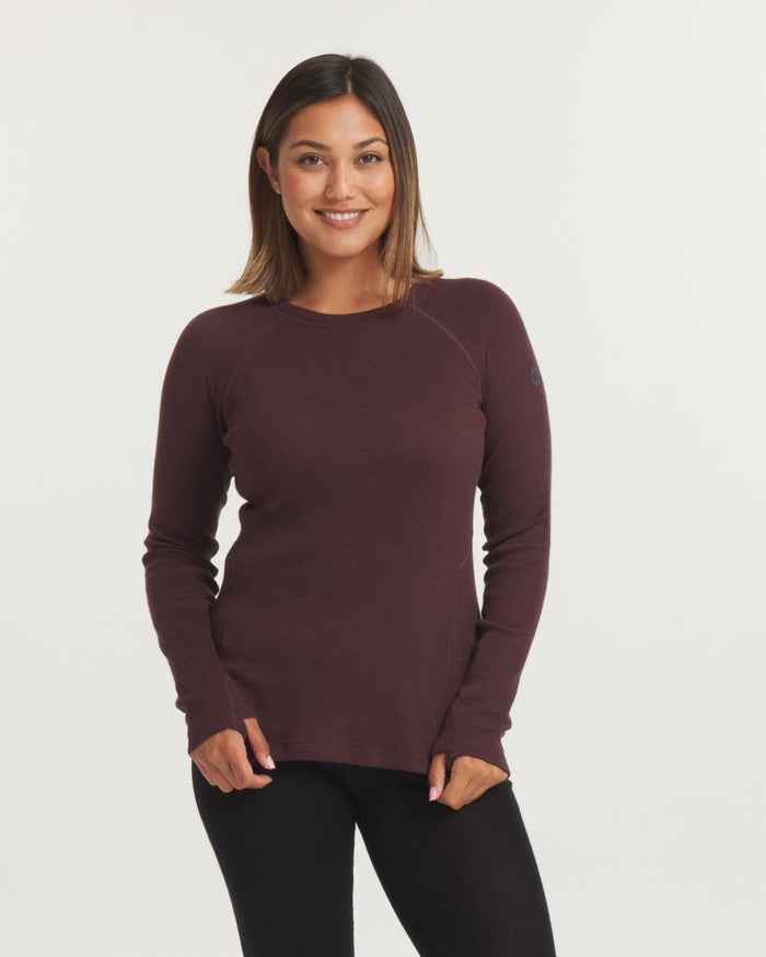 Front view of Women’s Thermal Crew alpaca baselayer top in burgundy showing slim fit, raglan sleeves and thumbholes
