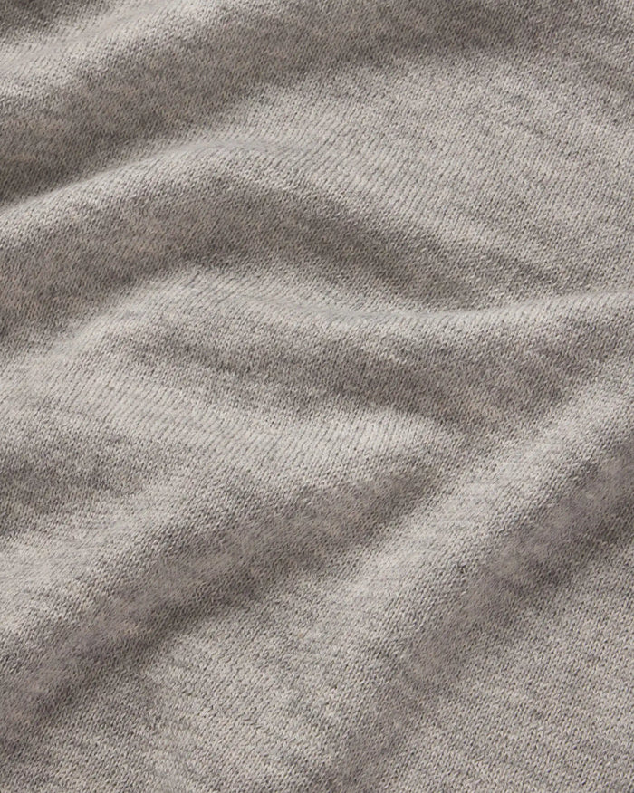 Close-up of Women’s Ultralight 1.0 Crew showing heather grey alpaca knit texture and fine stitch detail