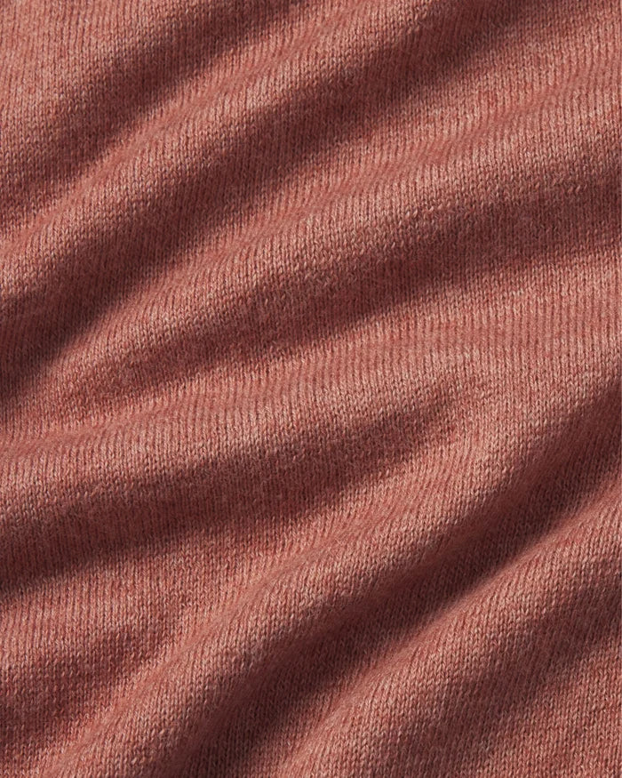 Close-up of textured red fabric with visible folds